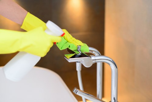 Carpet cleaning service area with protective measures and equipment in use