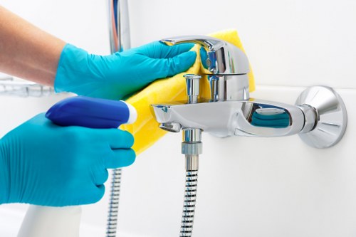 Deep cleaning a Queenspark bathroom during move-out cleaning