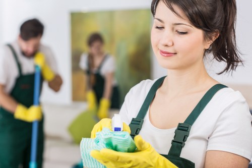 Local cleaners in Queenspark organizing a commercial cleaning space