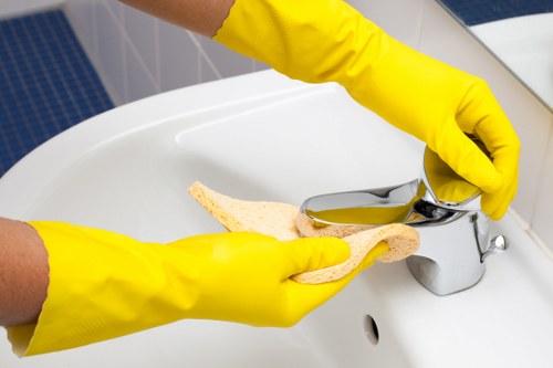 Upholstery cleaning treatment for a living room sofa in Queenspark